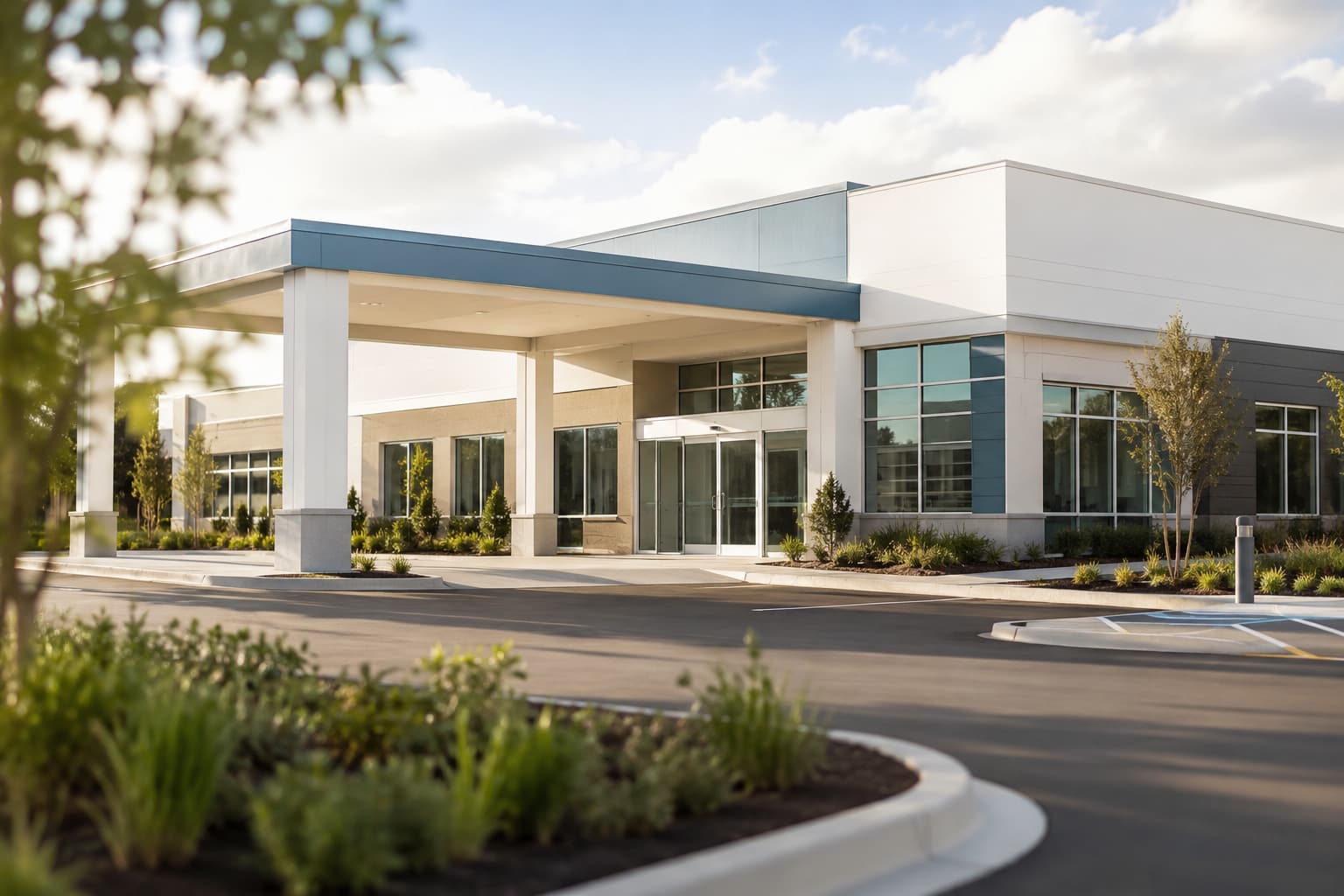 New clinic exterior at turnover, with the consolidated equipment delivery scheduled